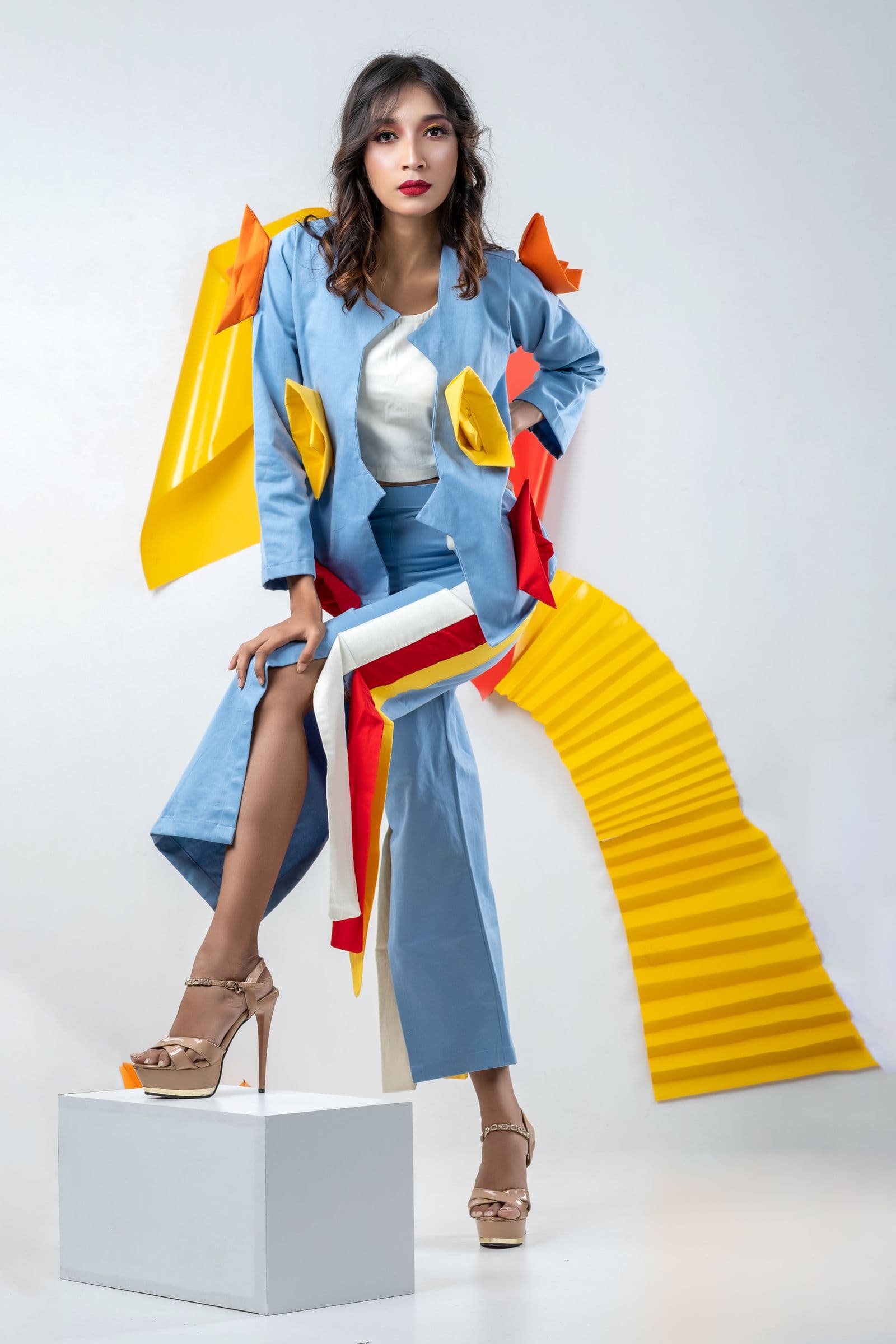 Original photo of a woman in a blue statement suit